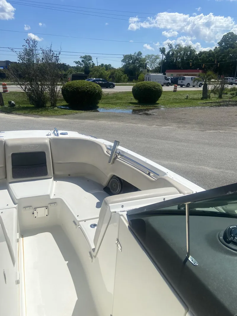 Slide: The Image of Boston Whaler 230 Vantage 2018 on parking lot under sunny skies. - 6