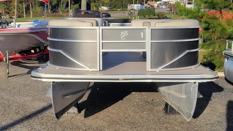Slide: The Image of 2020 Cypress Cay Seabreeze 232 pontoon boat on display outdoors. - 4