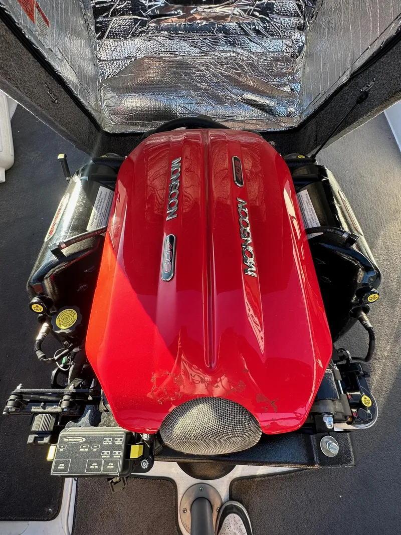 Slide: The Image of 2019 Malibu TXi Mo engine with red cover, showcasing powerful performance features. - 18