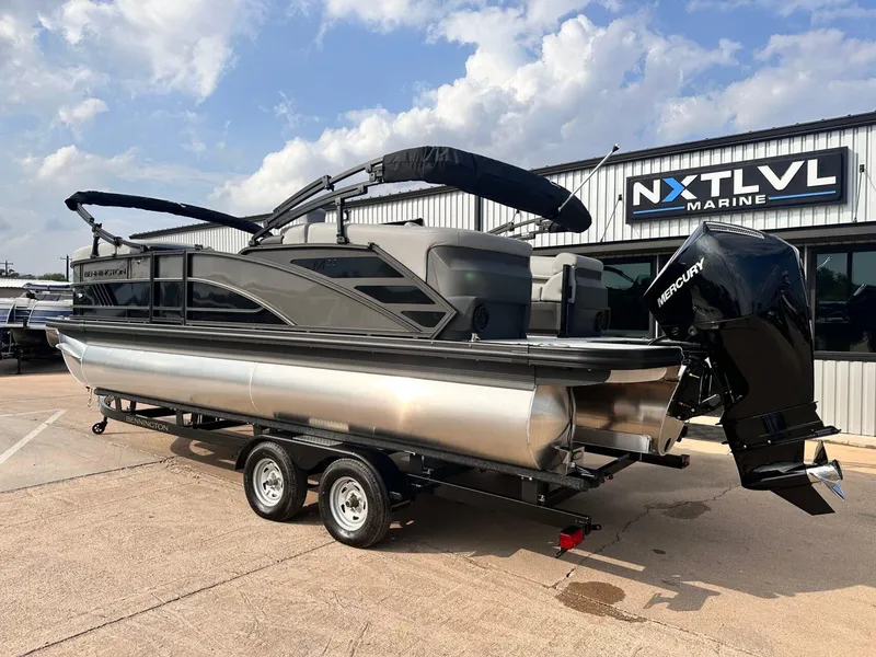 Slide: The Image of 2025 Bennington 22MFB pontoon boat with Mercury engine at NXT LVL Marine dealership. - 3