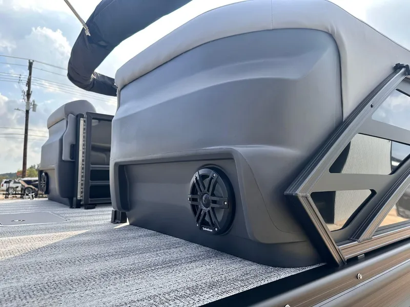 Slide: The Image of 2025 Bennington 22MFB boat interior with speaker and seating detail. - 7