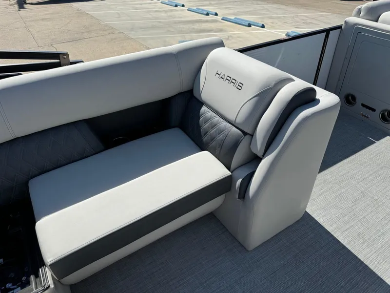 Slide: The Image of Luxurious seating on 2022 Harris Sunliner 250 pontoon boat, featuring elegant upholstery and design. - 20