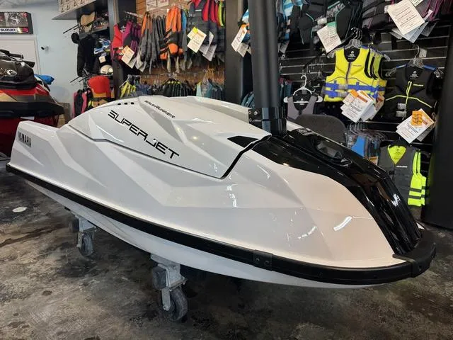 Slide: The Image of 2023 Yamaha Waverunner Superjet, sleek white design, close-up view. - 4