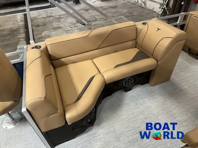 Slide: The Image of Luxurious seating on 2025 Tahoe Sport 23' Fish & Cruise boat, featuring tan upholstery. - 18