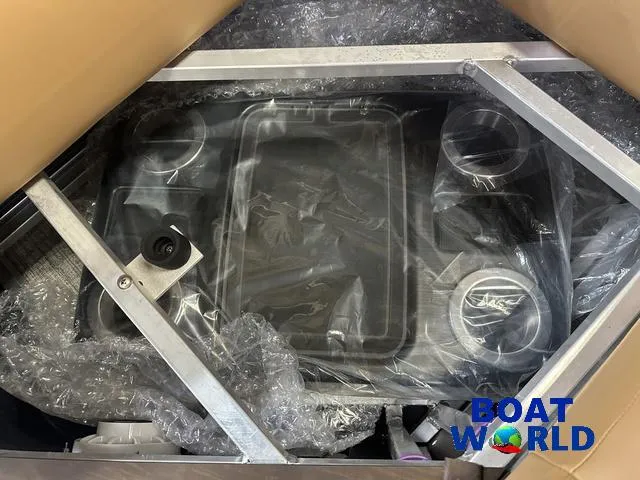 Slide: The Image of 2025 Tahoe Sport 23' Fish & Cruise boat interior with Honda 4-Stroke EFI, packaged for delivery. - 30