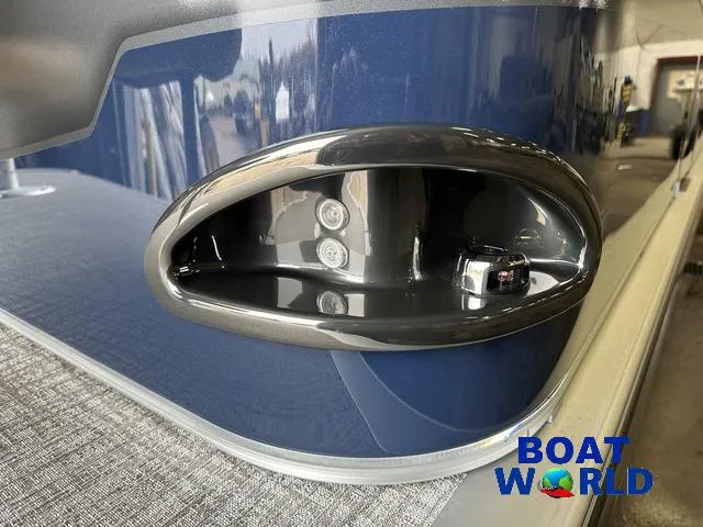Slide: The Image of Close-up of 2025 Tahoe Sport 23' Fish & Cruise boat detail with Boat World logo. - 39