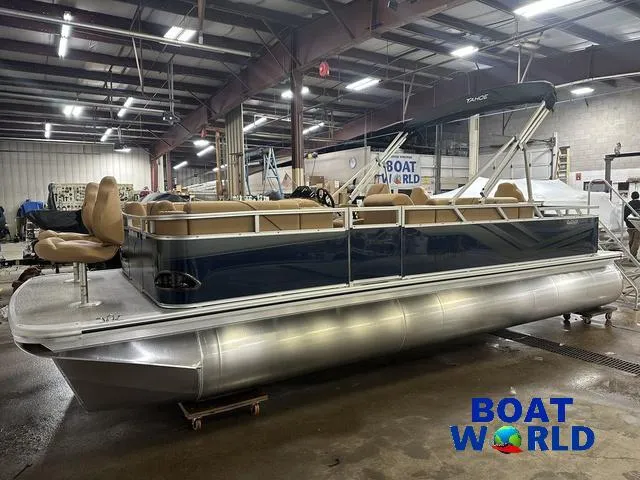 Slide: The Image of 2025 Tahoe Sport 23' Fish & Cruise pontoon boat in showroom, featuring Honda 4-Stroke EFI. - 41