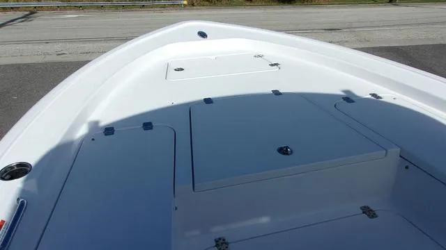 Slide: The Image of 2025 Sportsman Masters 247 boat deck with storage compartments. - 10