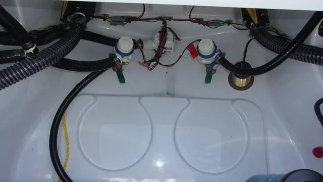 Slide: The Image of 2025 Sportsman Masters 247 boat interior wiring and plumbing setup. - 15