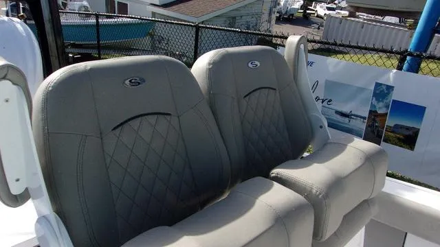 Slide: The Image of 2025 Sportsman Masters 247 boat seats with quilted design and logo. - 16