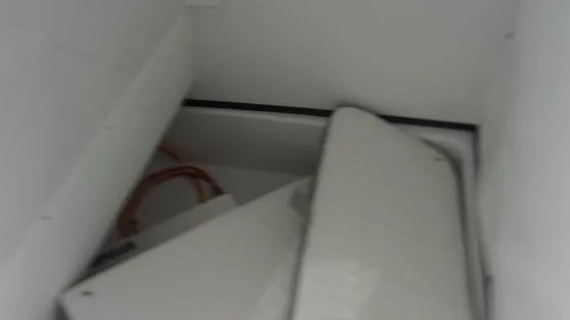 Slide: The Image of Interior view of a 2025 Sportsman Masters 247 boat compartment. - 19