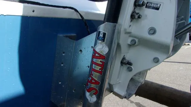 Slide: The Image of Close-up of 2025 Sportsman Masters 247 boat with Atlas hydraulic jack plate. - 3