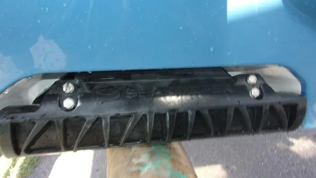 Slide: The Image of Close-up of a 2025 Sportsman Masters 247 boat part, featuring a black component. - 5