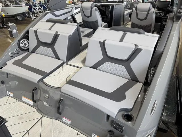 Slide: The Image of 2025 Yamaha Boats 222XE interior with modern seating and sleek design. - 5