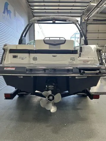 Slide: The Image of 2025 Chaparral 247 SSX boat interior with sleek seating and swim platform. - 4