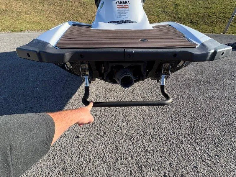 Slide: The Image of 2015 Yamaha Waverunner VX Cruiser rear view with boarding step on pavement. - 10