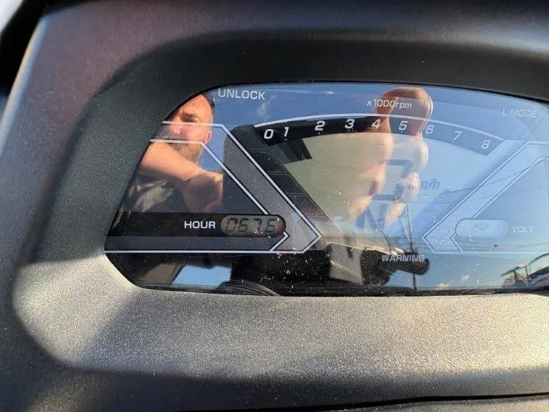 Slide: The Image of Close-up of 2015 Yamaha Waverunner VX Cruiser dashboard, showing hour meter and RPM gauge. - 18