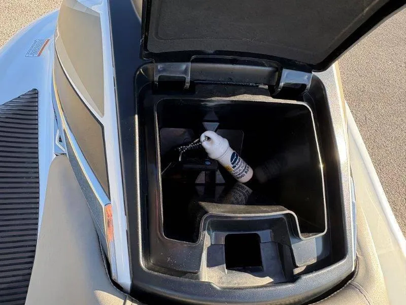 Slide: The Image of Open storage compartment of 2015 Yamaha Waverunner VX Cruiser with a bottle inside. - 20