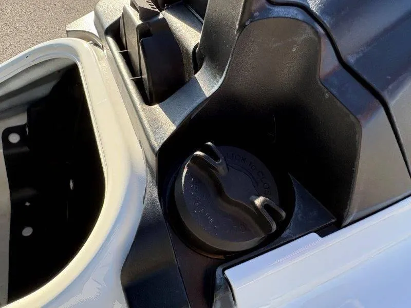 Slide: The Image of 2015 Yamaha Waverunner VX Cruiser fuel cap and storage compartment. - 21