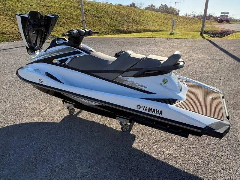 Slide: The Image of 2015 Yamaha Waverunner VX Cruiser jet ski on pavement, side view. - 27