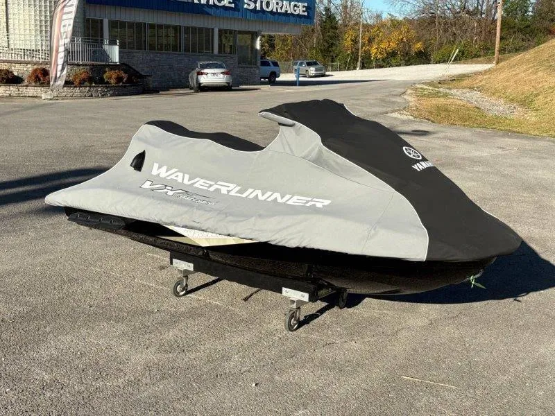 Slide: The Image of 2015 Yamaha Waverunner VX Cruiser covered, parked outside storage facility. - 32
