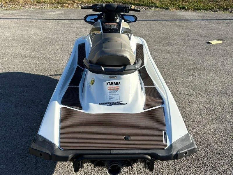 Slide: The Image of 2015 Yamaha Waverunner VX Cruiser jet ski, rear view on pavement. - 4