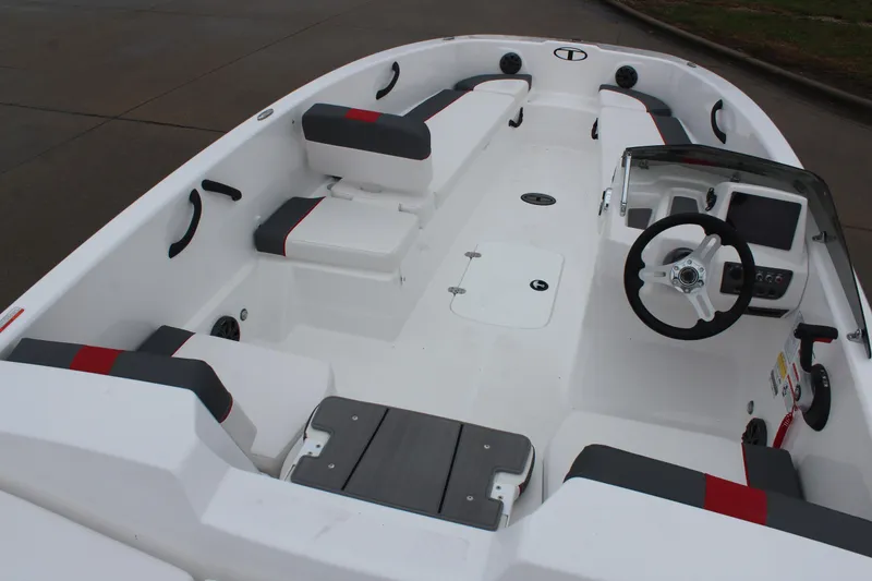 Slide: The Image of 2025 Tahoe T18 boat interior with modern seating and steering wheel. - 15