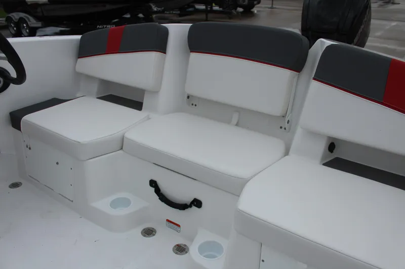 Slide: The Image of 2025 Tahoe T18 boat seating with white and gray cushions, red accents. - 20