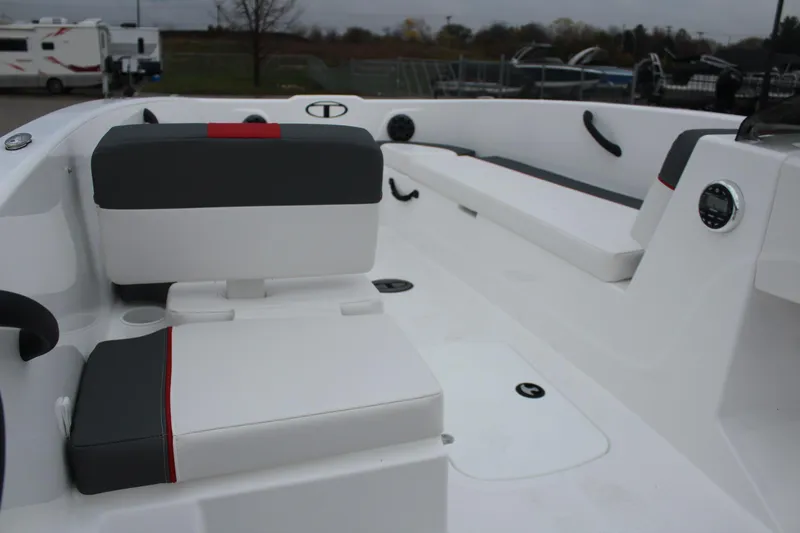 Slide: The Image of 2025 Tahoe T18 boat interior with sleek seating and modern design. - 24