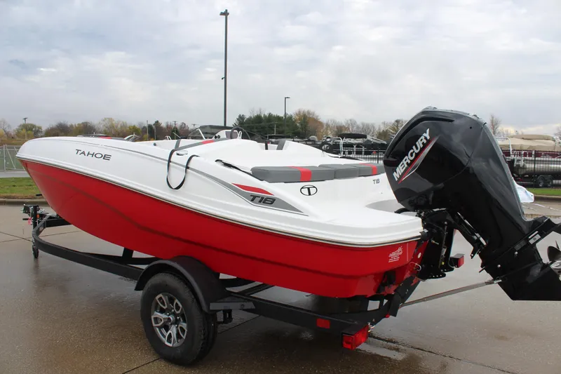 Slide: The Image of 2025 Tahoe T18 boat with Mercury engine on trailer, red and white design. - 5
