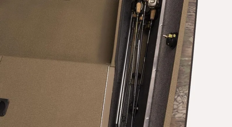 Slide: The Image of 2023 G3 Sportsman 1610 boat interior with fishing rod storage compartment. - 11