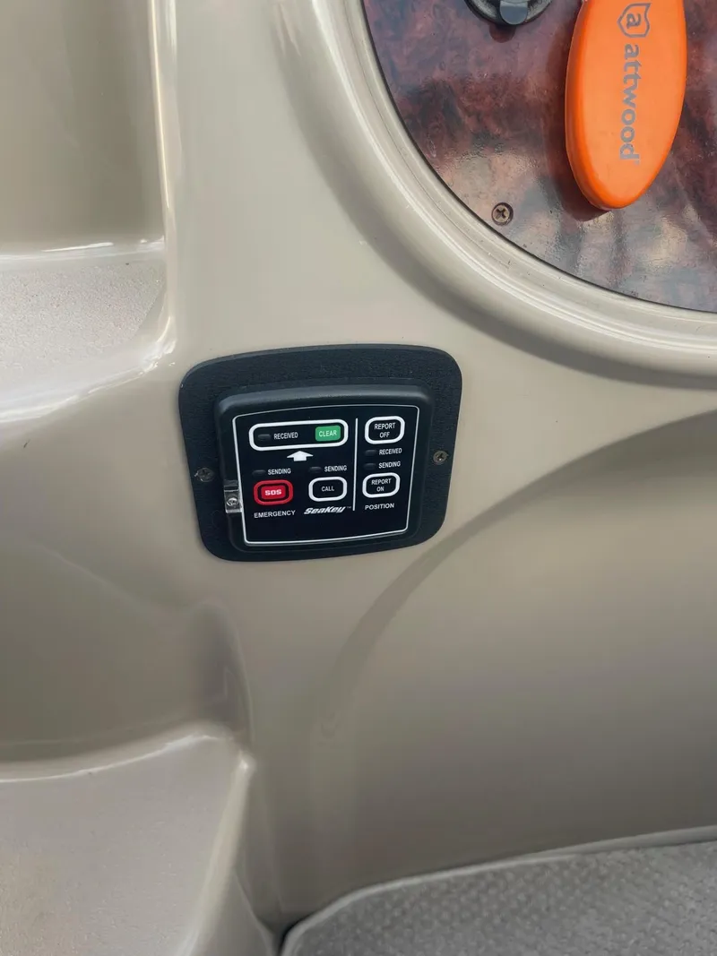 Slide: The Image of Control panel on a 2005 Four Winns 248 Vista boat dashboard. - 11