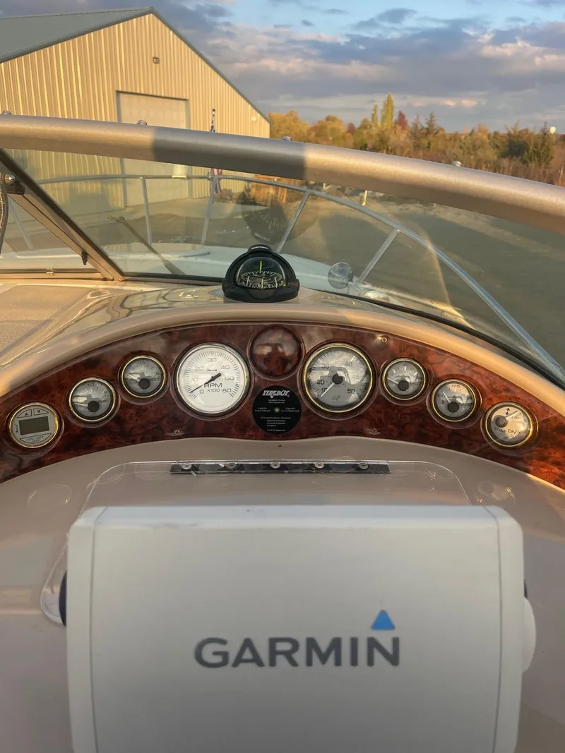Slide: The Image of 2005 Four Winns 248 Vista boat dashboard with Garmin navigation system. - 14