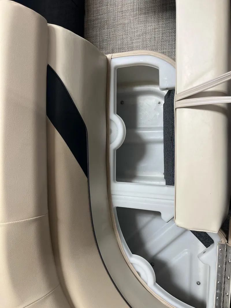Slide: The Image of 2024 G3 SunCatcher X320 Cruise boat interior seating and storage compartment. - 14