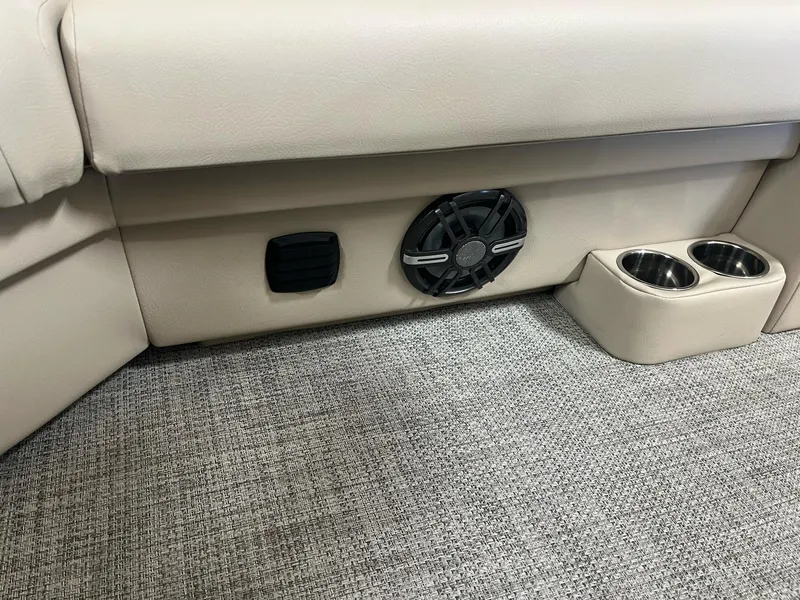 Slide: The Image of 2024 G3 SunCatcher X320 Cruise interior with speaker and cup holders. - 18