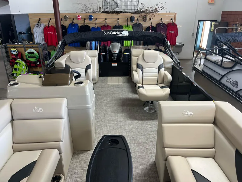 Slide: The Image of 2024 G3 SunCatcher X320 Cruise pontoon boat interior with beige seating. - 4