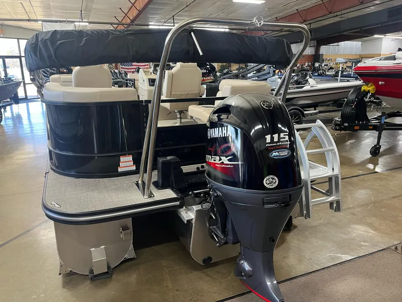 Slide: The Image of 2024 G3 SunCatcher X320 Cruise pontoon boat with Yamaha 115 engine in showroom. - 5