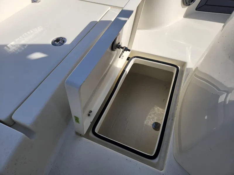 Slide: The Image of 2025 Pathfinder 2600 HPS boat storage compartment, open and empty. - 17