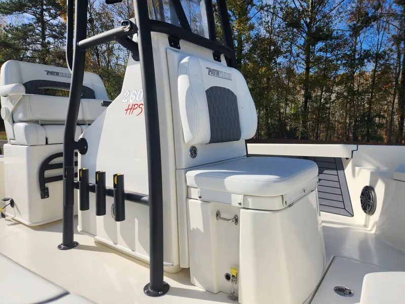 Slide: The Image of 2025 Pathfinder 2600 HPS boat interior with seating and console details. - 18