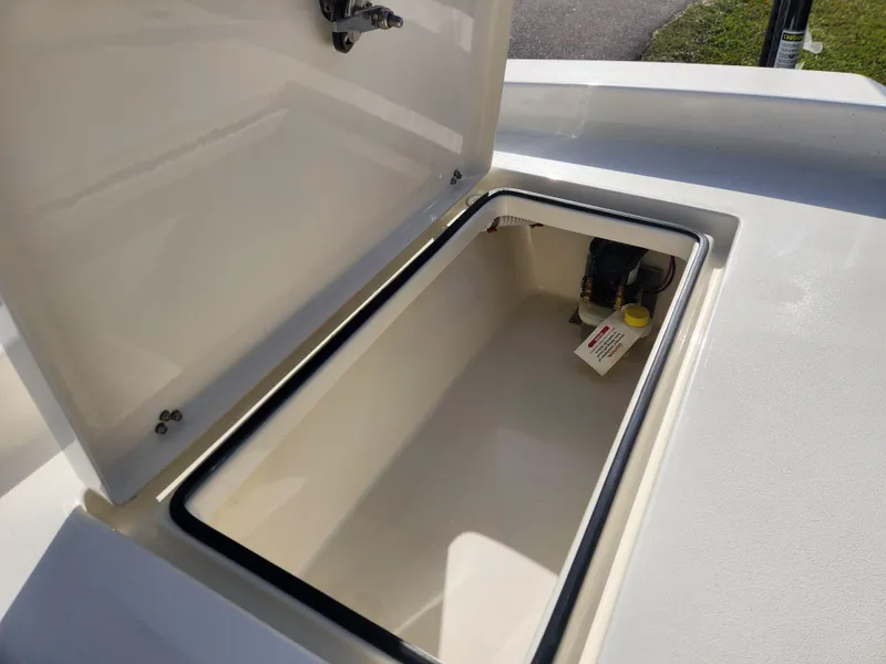 Slide: The Image of Open storage compartment on 2025 Pathfinder 2600 HPS boat. - 33