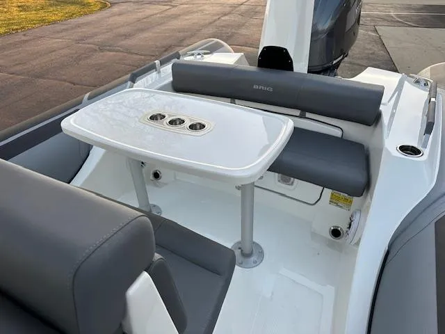 Slide: The Image of 2025 Brig Eagle 8 boat interior with seating and table. - 17