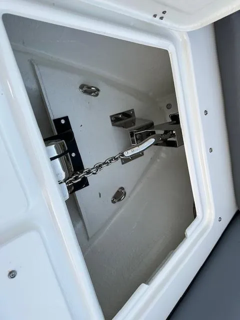 Slide: The Image of 2025 Brig Eagle 8 anchor compartment with chain and metal fittings. - 28