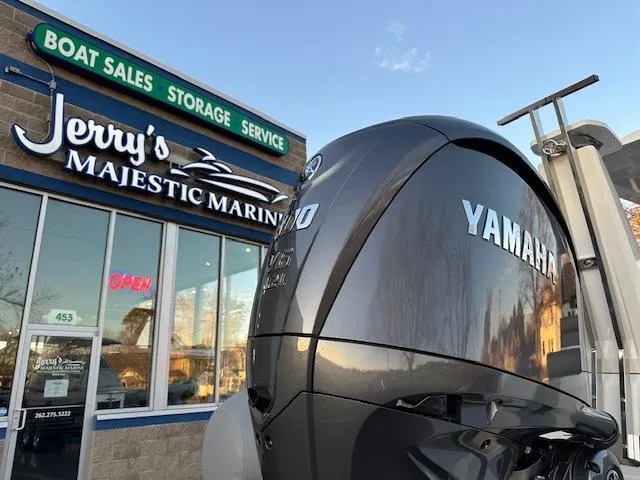 Slide: The Image of Yamaha engine at Jerry's Majestic Marine, featuring 2025 Brig Eagle 8 boat. - 8