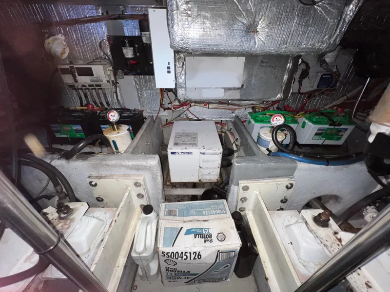 Slide: The Image of Engine room of 2004 Silverton 39 Motor Yacht with batteries and equipment. - 31