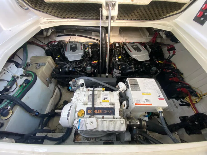 Slide: The Image of Engine compartment of 2015 Bayliner 335 Cruiser with Kohler diesel generator. - 13