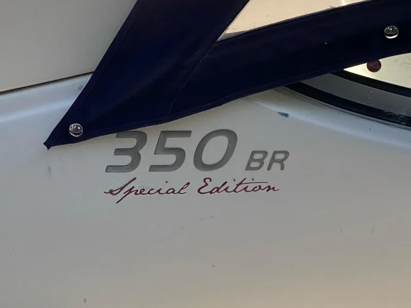 Slide: The Image of Bayliner 335 Cruiser 2015, 350 BR Special Edition logo detail. - 14