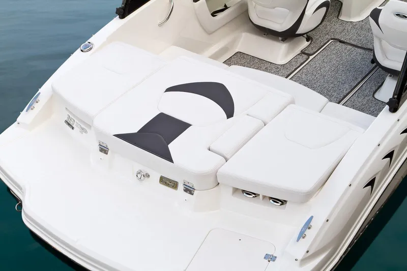 Slide: The Image of 2016 Chaparral 19 H2O Sport boat interior with white seating and modern design. - 25