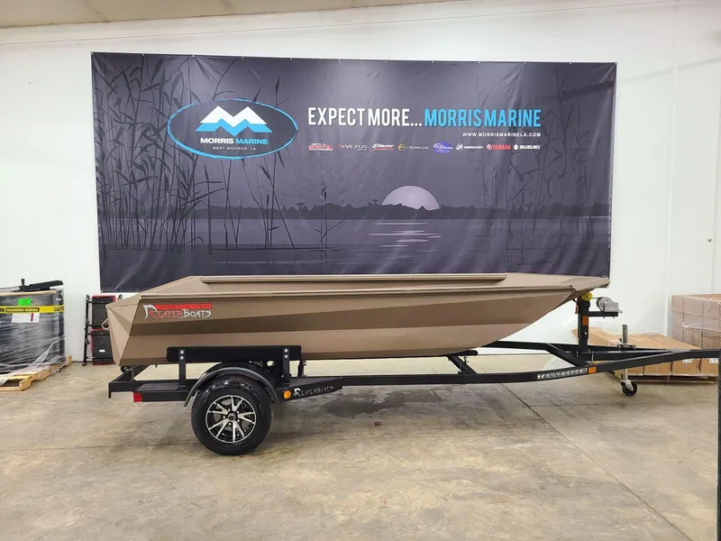 Slide: The Image of 2024 Reaper Boats 550 on trailer at Morris Marine showroom. - 1