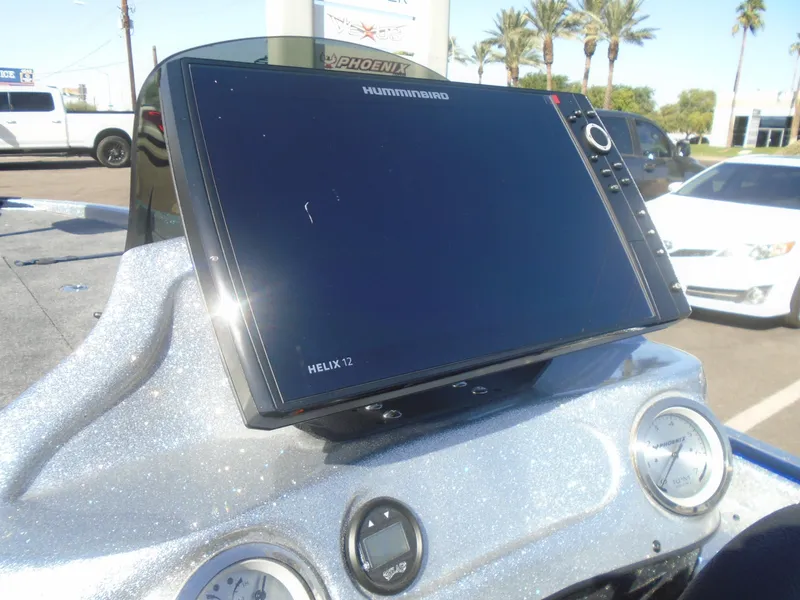 Slide: The Image of Dashboard of 2005 Phoenix 921 ELITE with Humminbird Helix 12 display. - 11