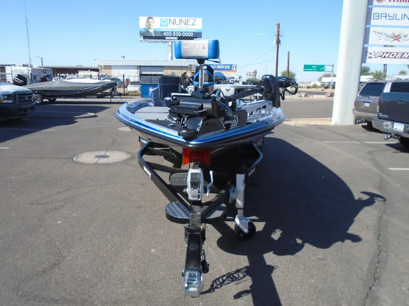 Slide: The Image of 2005 Phoenix 921 ELITE boat on trailer in parking lot. - 12